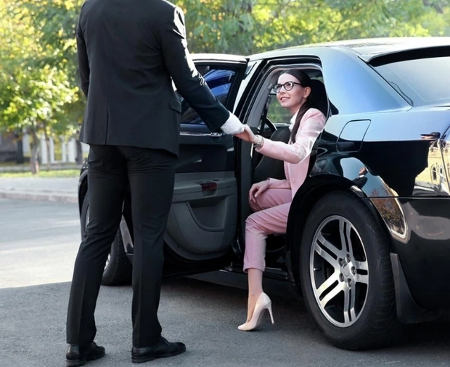 Elegant arrival in luxury vehicle.